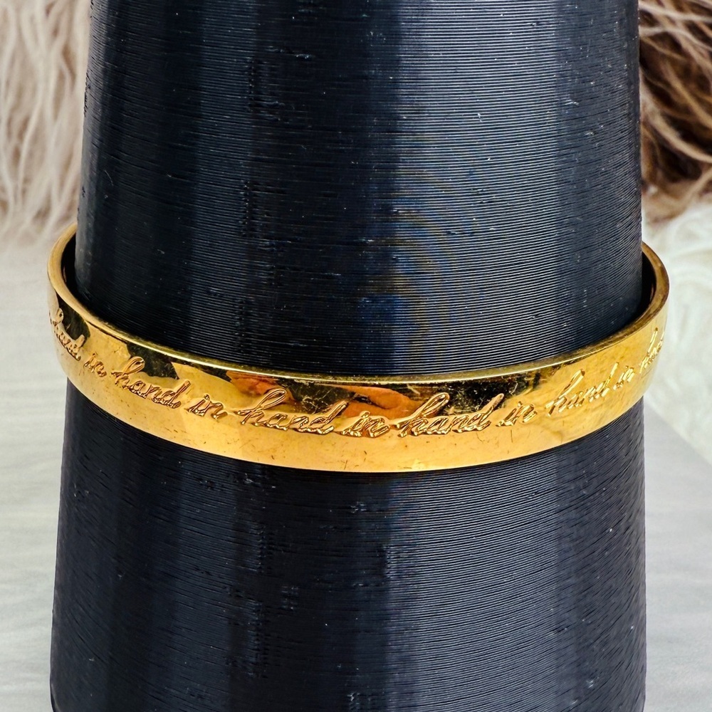 Kate Spade “Hand and Hand” inscribed Goldtone Bangle Bracelet - Picture 7 of 15